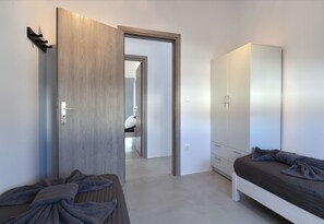Apartment, 3 Bedrooms | 3 bedrooms, in-room safe, iron/ironing board, free cribs/infant beds