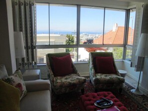 Apartment, 1 Bedroom | Living area | Flat-screen TV - Ocean View (Cape Town)