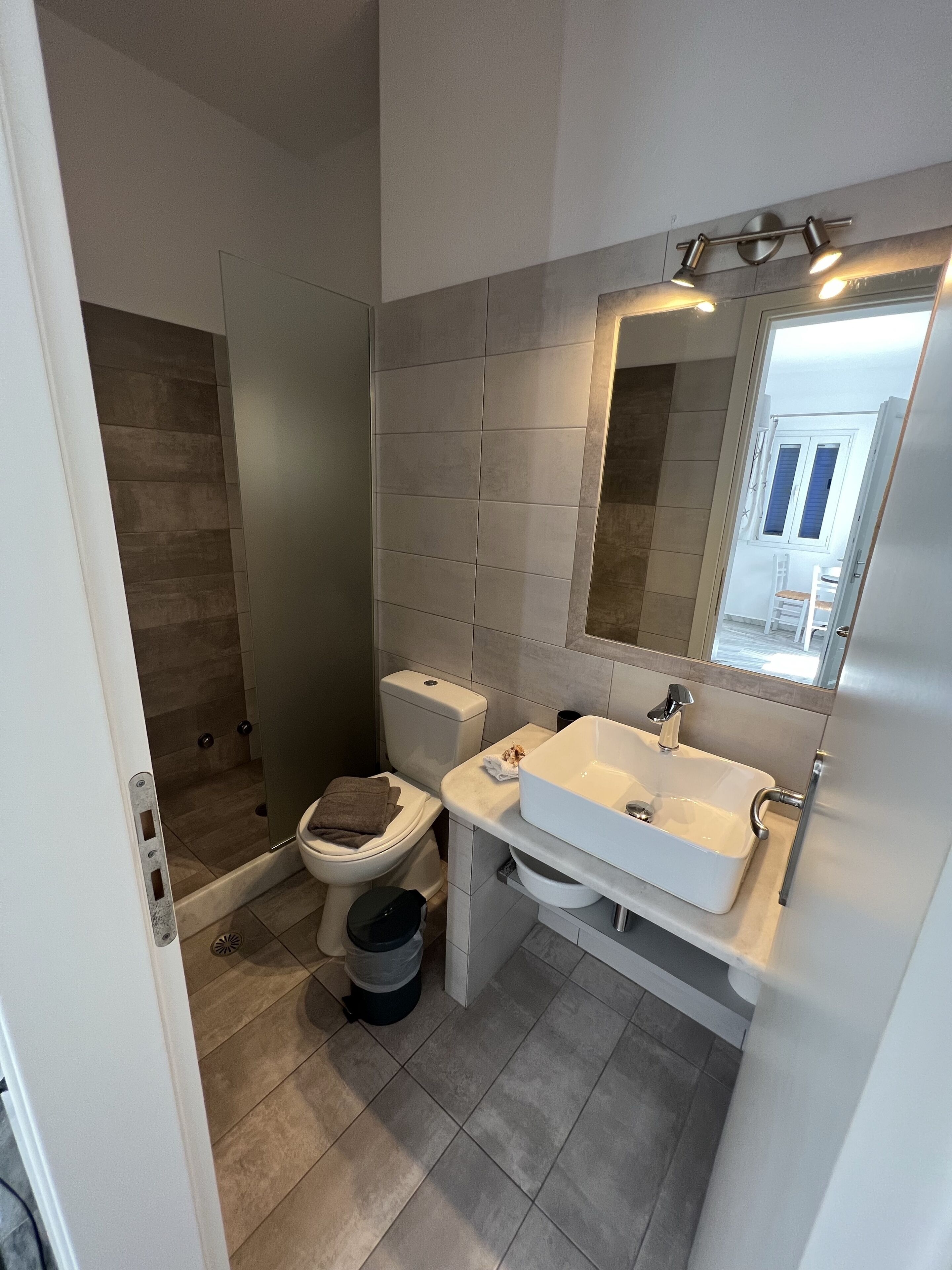 apartment, 1 bedroom (3 adults) | bathroom | shower, rainfall showerhead, free toiletries, hair dryer