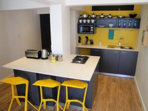 Studio, 1 Queen Bed | Private kitchen | Fridge, microwave, oven, stovetop - Mobema Court (Cape Town)
