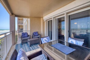 Outdoor dining - Sandpiper-Lovely direct beachfront condo ~ SP305 (New Smyrna Beach)