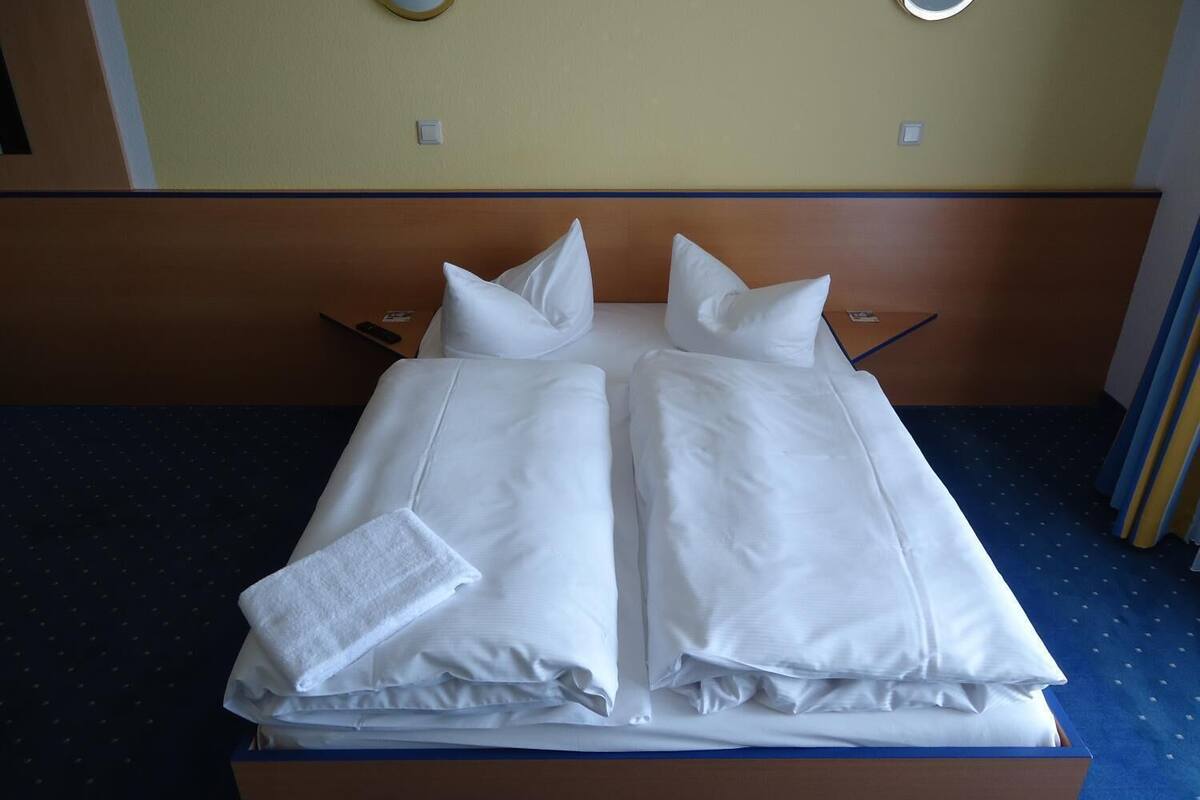 premium bedding, desk, blackout curtains, free wifi