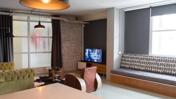 Studio, 1 Bedroom | Living area | Plasma TV, Netflix, DVD player