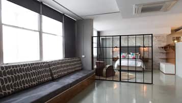 Studio, 1 Bedroom | Living area | Plasma TV, Netflix, DVD player