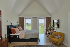 Orange Deluxe Suite | 埃及棉床单、高档床上用品、羽绒被、特色家居