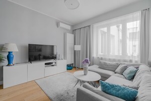 Deluxe Apartment, 2 Bedrooms | Living area | Flat-screen TV