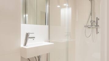 Deluxe Apartment, 2 Bedrooms | Bathroom | Separate bathtub and shower, deep-soaking bathtub, rainfall showerhead
