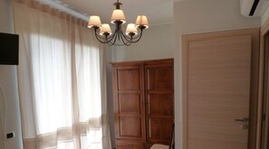 Individually decorated, individually furnished, desk, blackout curtains