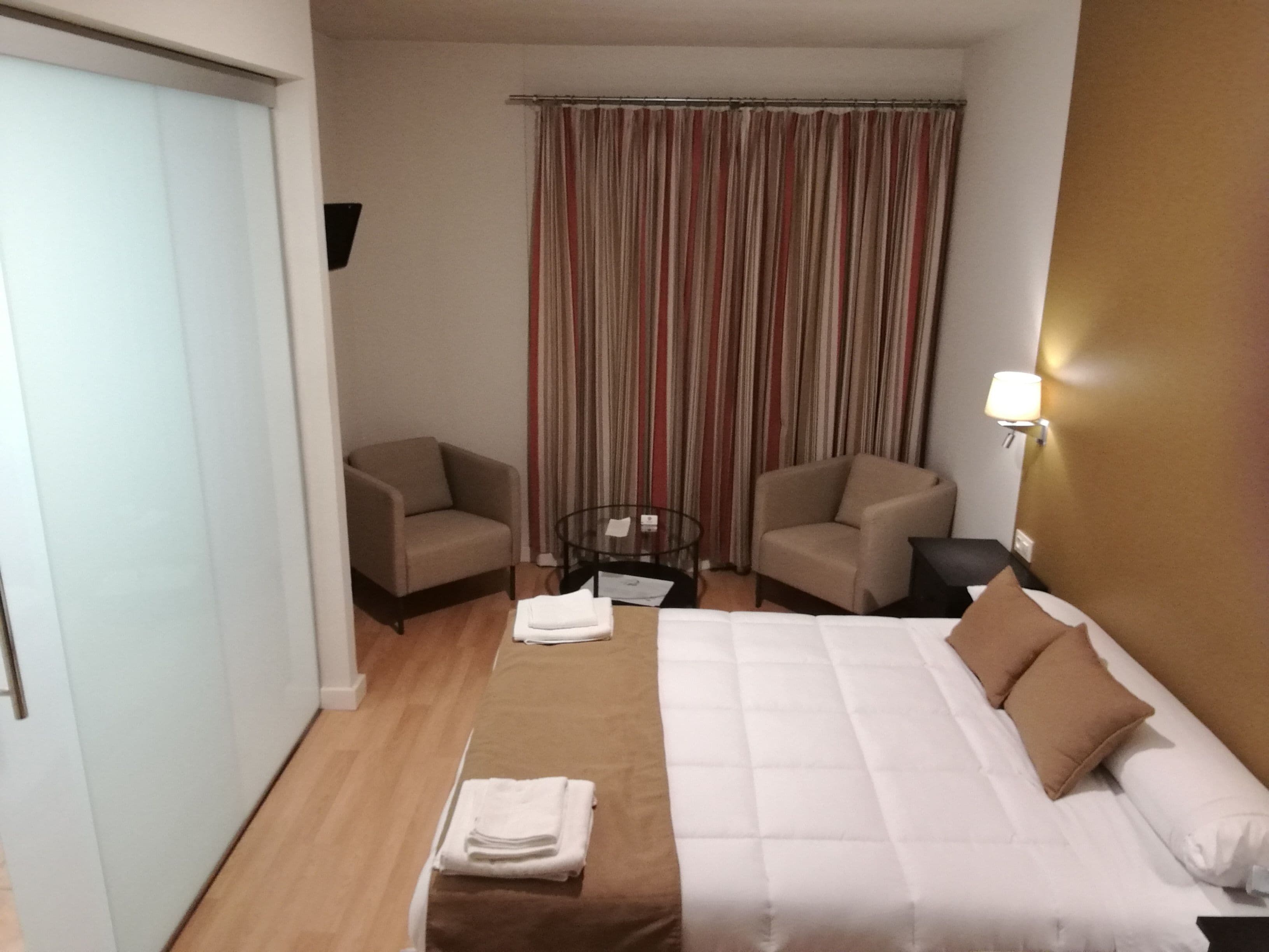 Blackout drapes, iron/ironing board, free WiFi, bed sheets