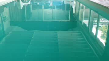 Indoor pool, sun loungers