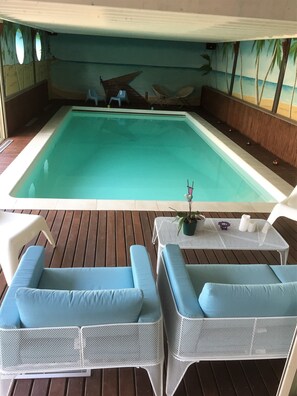 Indoor pool, sun loungers