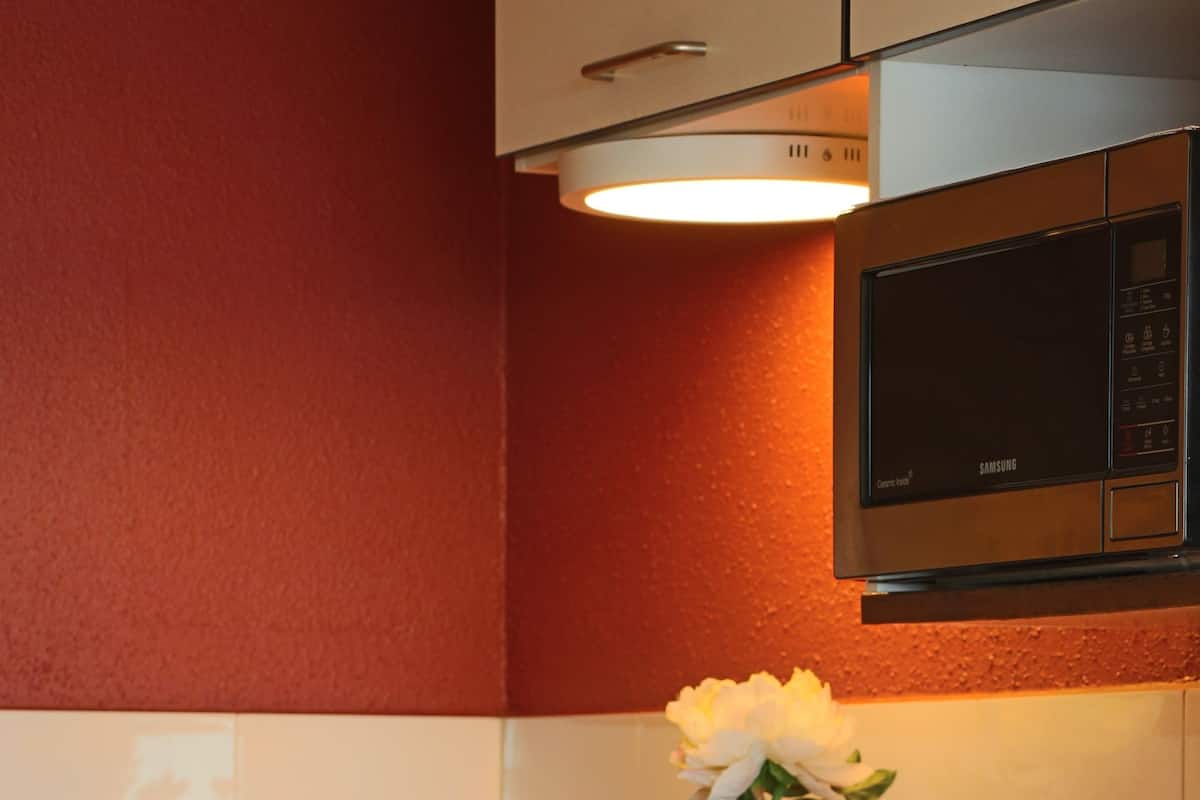 Apartamento, 1 cama de casal, sacada | Cozinha americana privada | Frigobar