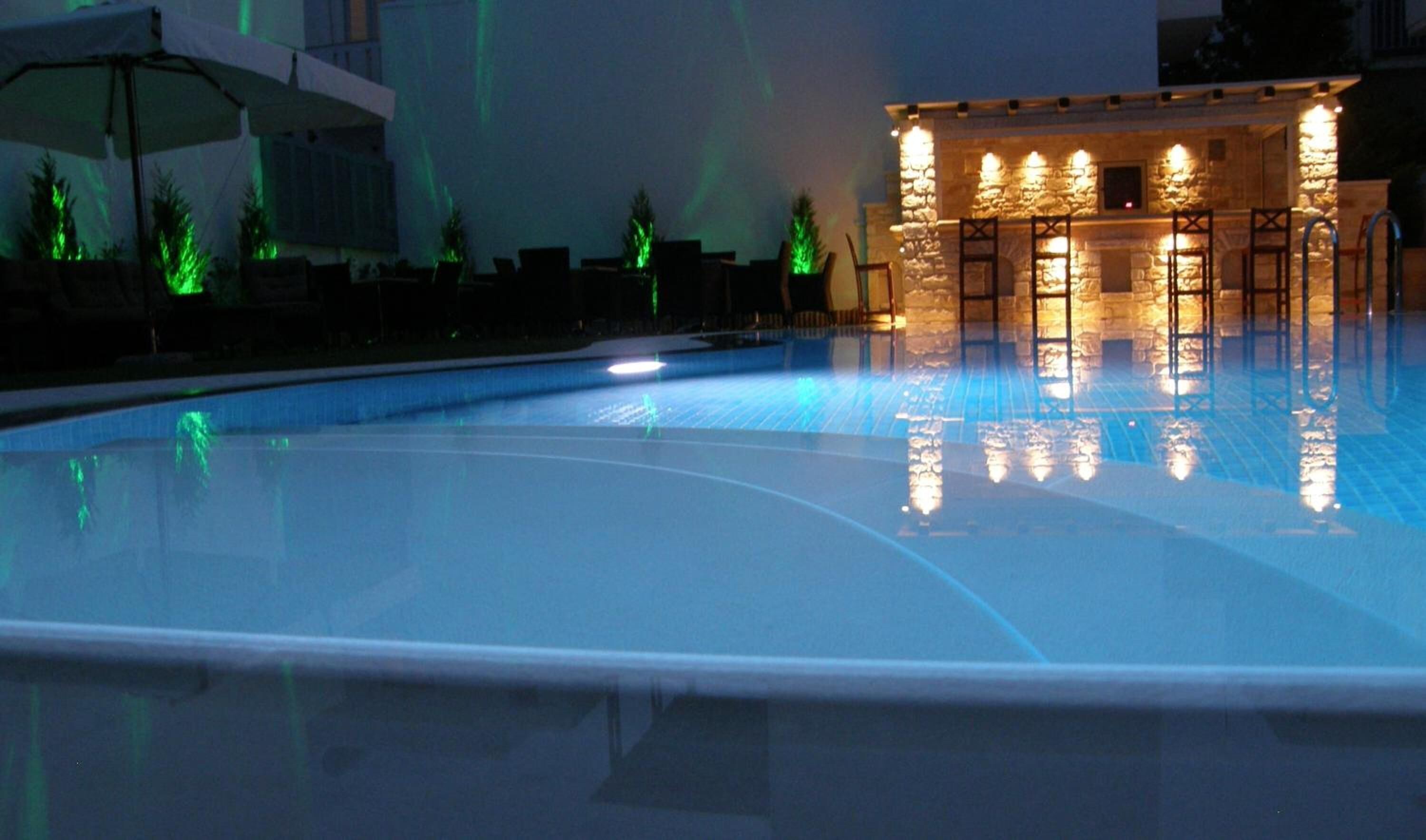 seasonal outdoor pool, pool umbrellas, pool loungers