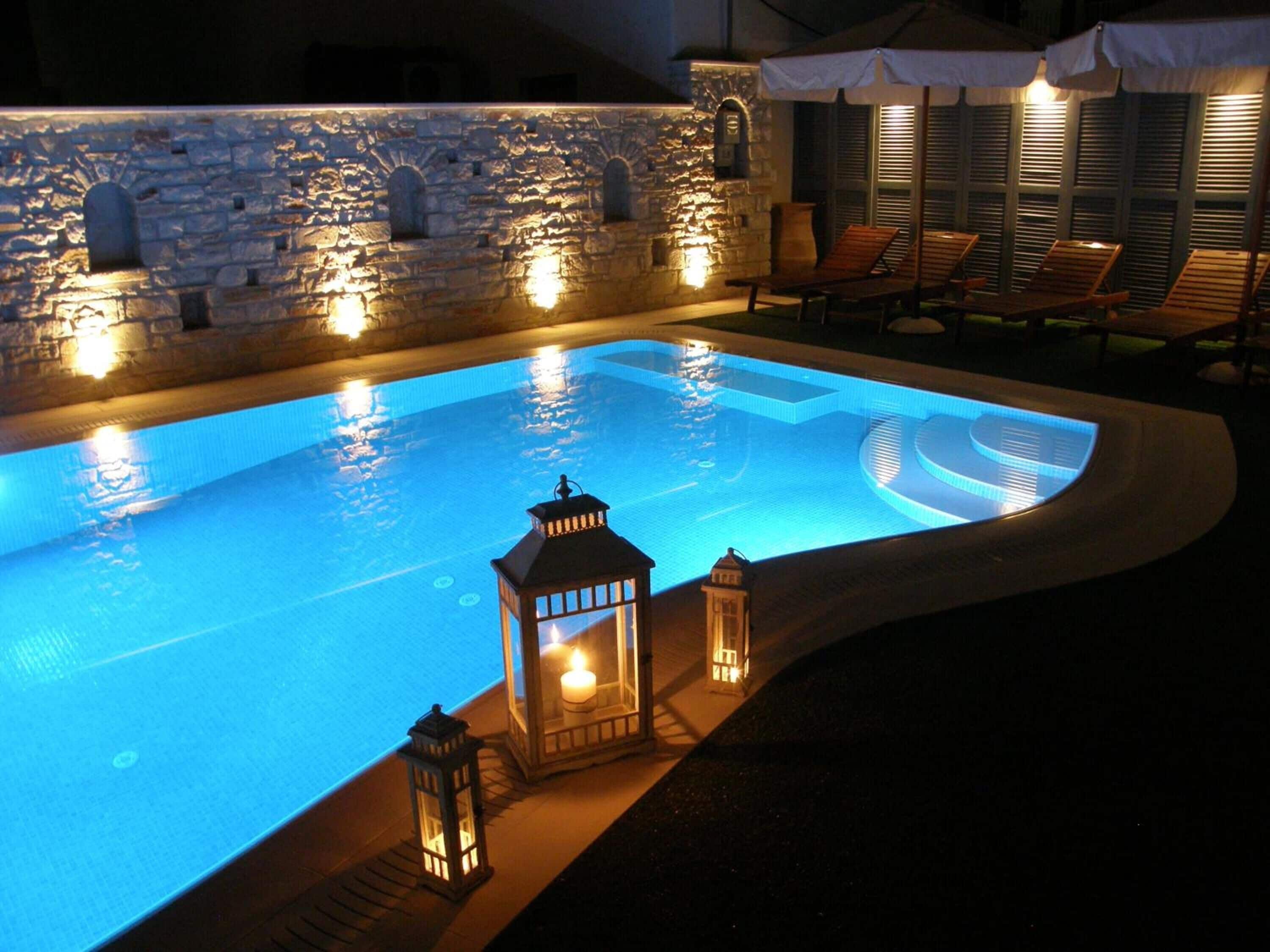 seasonal outdoor pool, pool umbrellas, pool loungers