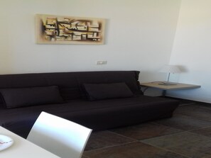 Panorámás stúdió, kilátással az óceánra, óceánra néző | Nappalirész