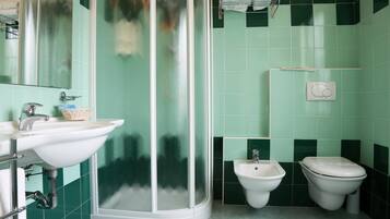 Shower, free toiletries, hair dryer, bathrobes
