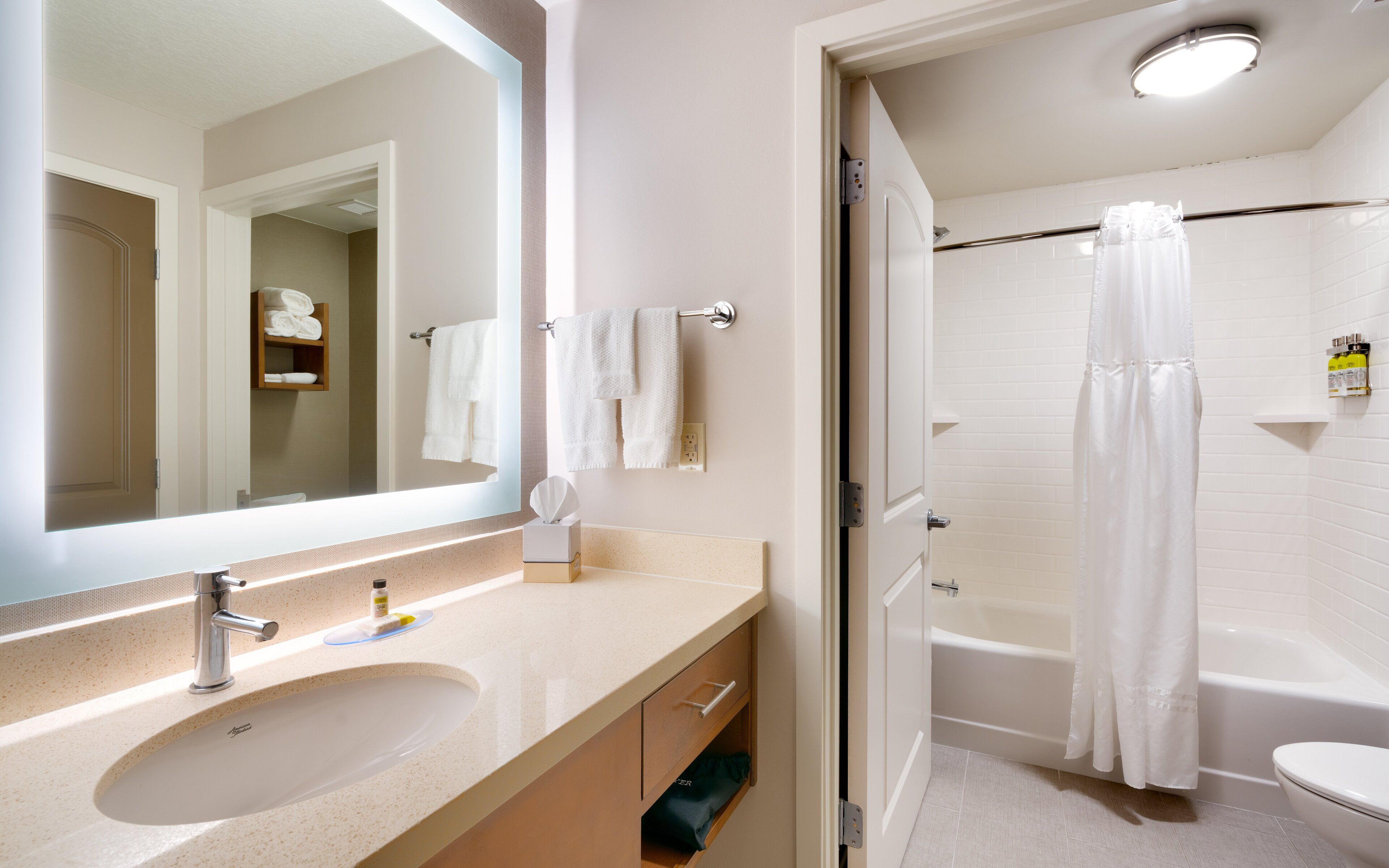 combined shower/bathtub, hair dryer, towels, soap
