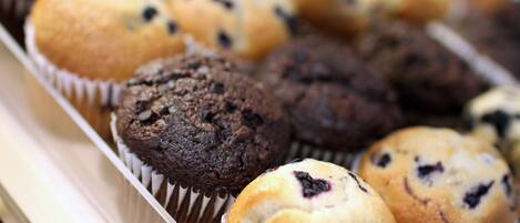 A tray of muffins in paper liners.