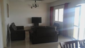 Apartment, 2 Bedrooms | Living room | Flat-screen TV - Cecilia Lodge (Gamba)