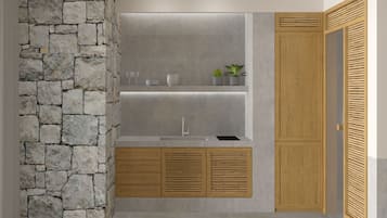 Signature Suite Sea View with Private Pool | Cocina privada | Frigorífico, placa de cocina y máquina de café espresso