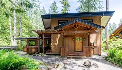 Hot tub, sauna, large open great room, spacious kitchen, pet friendly, trails.