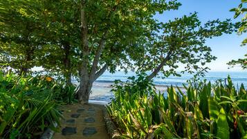 On the beach, sun-loungers, beach towels