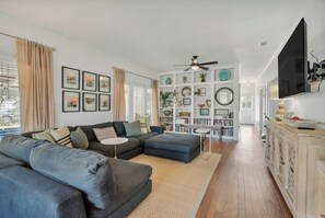 Smart TV, DVD player, foosball, books