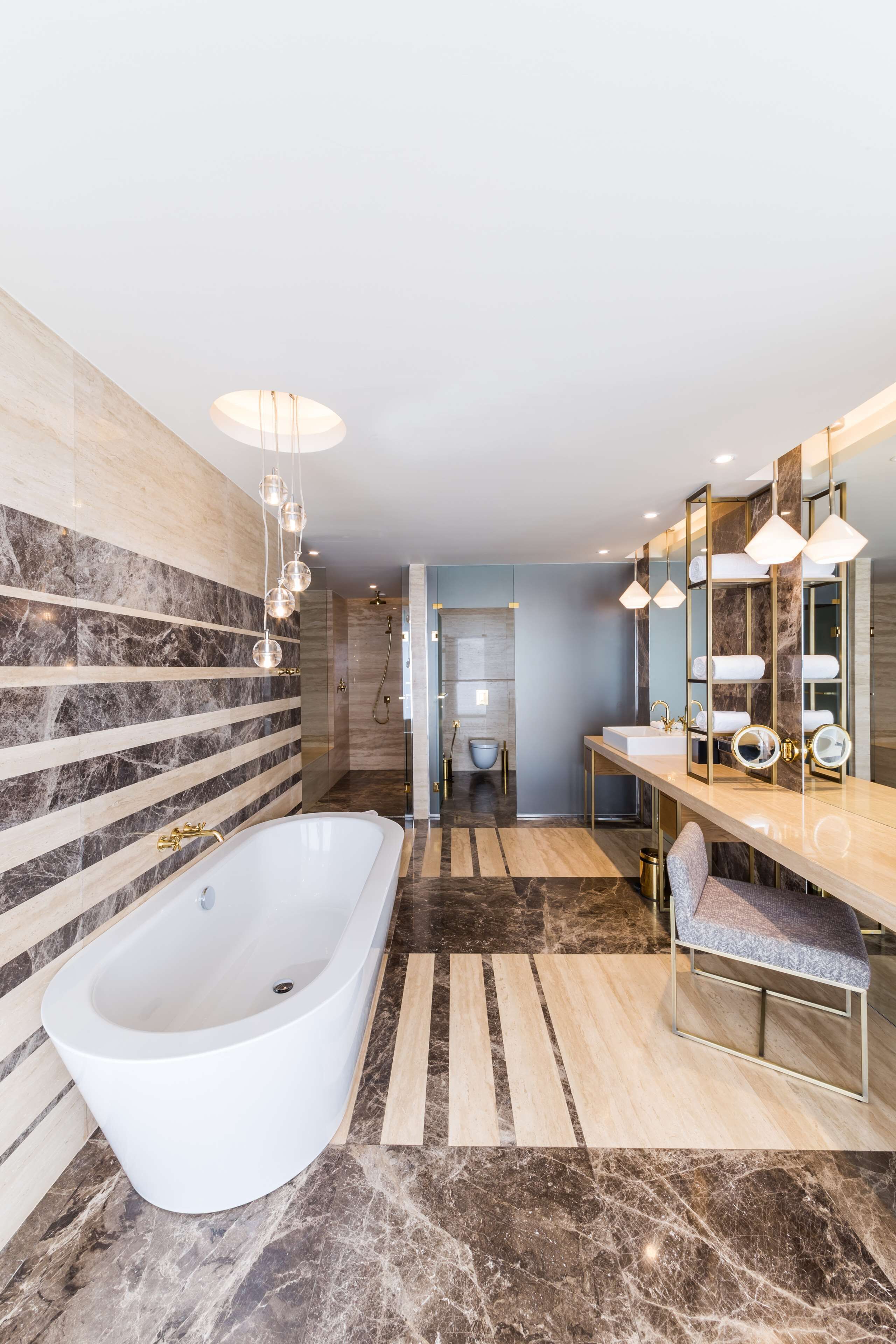 presidential suite (panoramic view) | bathroom | rainfall showerhead, free toiletries, hair dryer, bathrobes