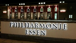 A building with the sign "PHILHARMONIE ESSEN" indicating a venue or establishment. - Hotel Luise (Essen)