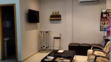 27-inch flat-screen TV with cable channels, TV