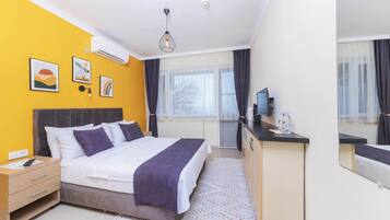 Premium bedding, blackout drapes, soundproofing, free WiFi