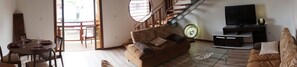 Duplex, Kitchenette, Mezzanine | Living room | Flat-screen TV - Hôtel Le Dronmi (Cayenne)