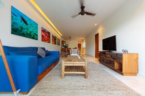 Business Townhome, 2 Bedrooms, Balcony | Living room | Flat-screen TV, pay films - Superb 2BR condo walking distance to everywhere by Happy Address (Playa del Carmen)