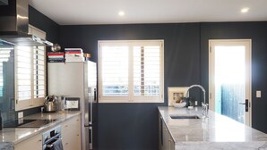 Casa adosada, 2 habitaciones | Cocina privada