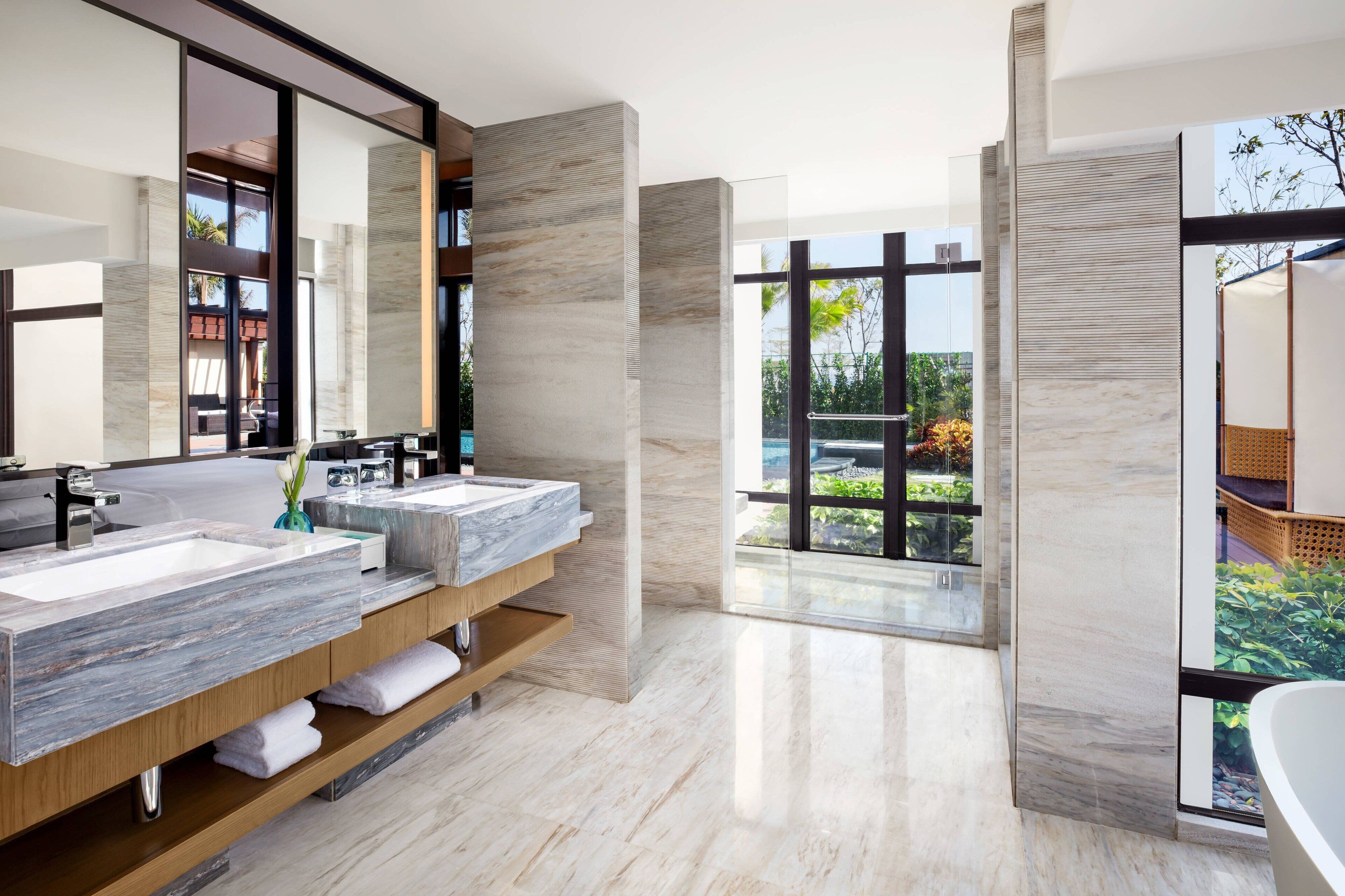 separate bathtub and shower, deep-soaking bathtub, rainfall showerhead