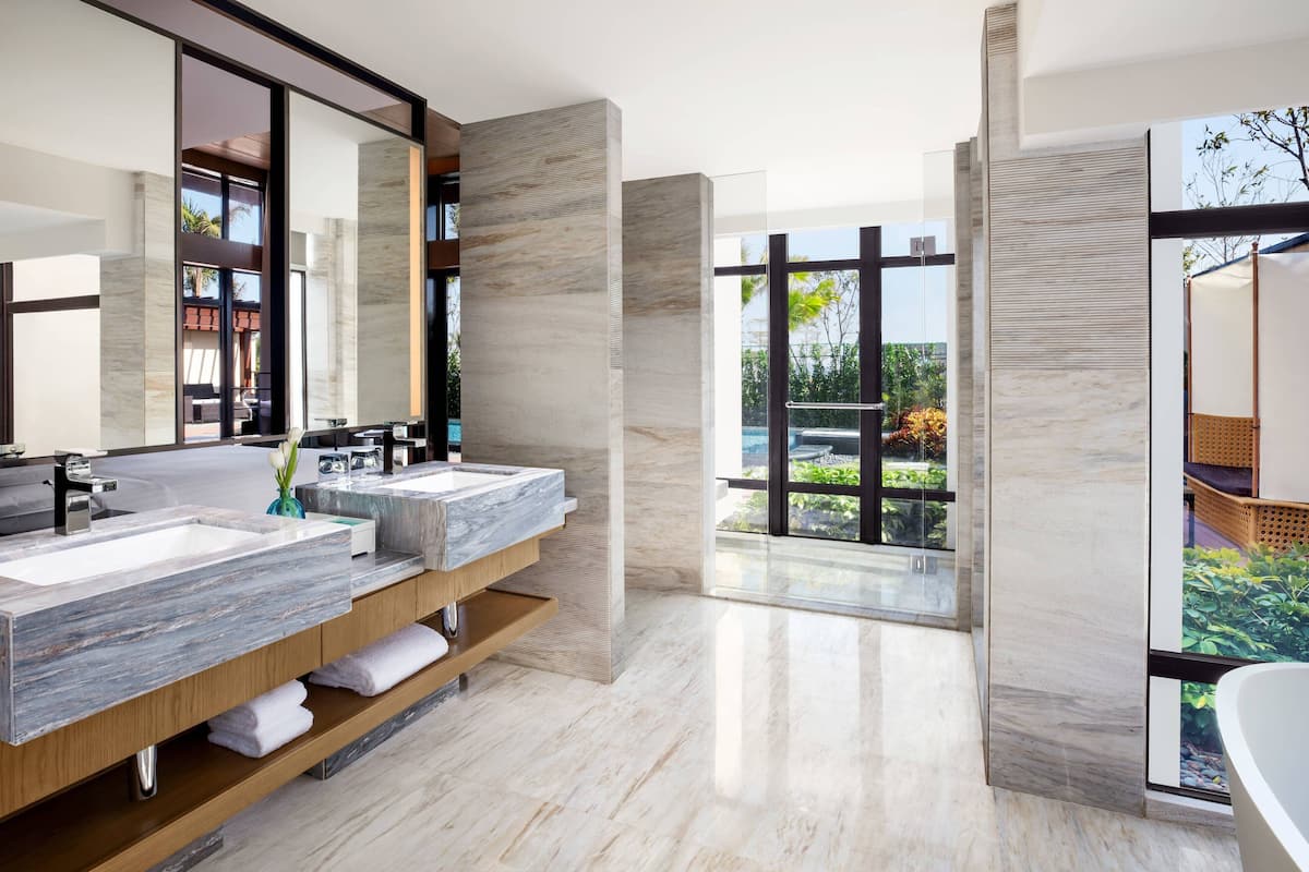 separate bathtub and shower, deep-soaking bathtub, rainfall showerhead