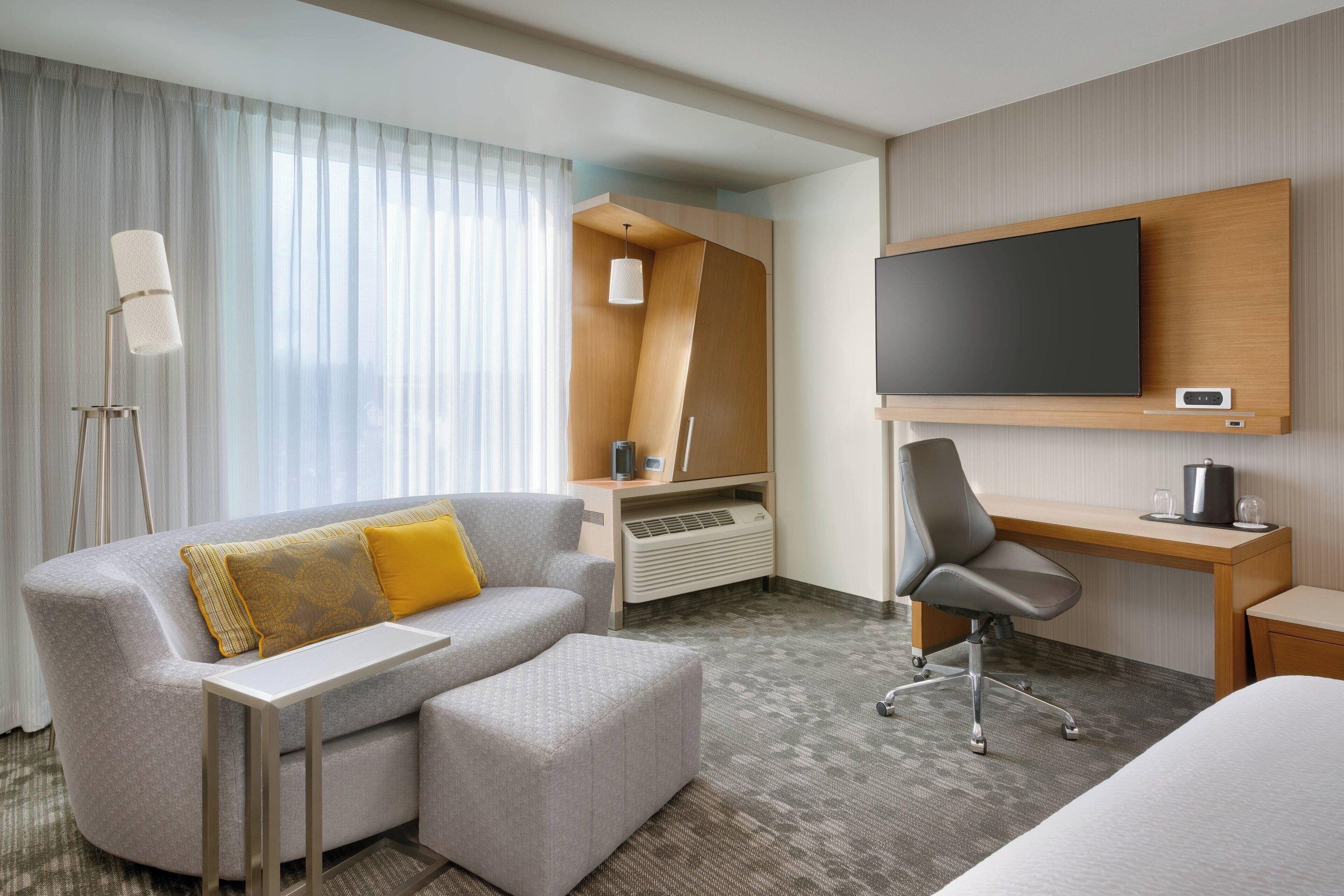 desk, laptop workspace, blackout curtains, iron/ironing board