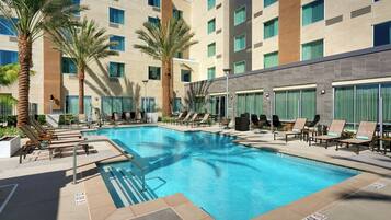 Outdoor pool, open 8:00 AM to 10:00 PM, pool loungers