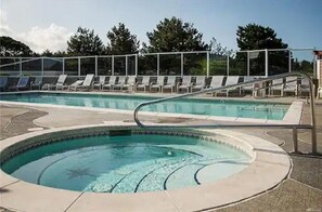 Outdoor pool, a heated pool - Ground Floor Beach Condo • Ocean Views • Pool • Hot Tub • Gym • Pet Friendly (Westport)