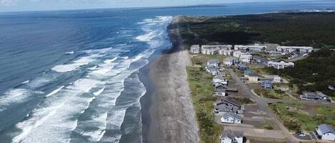 On the beach, sun loungers, beach towels