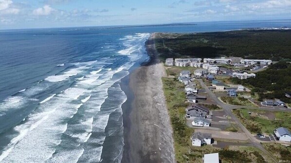 On the beach, sun-loungers, beach towels - Ground Floor Beach Condo • Ocean Views • Pool • Hot Tub • Gym • Pet Friendly (Westport)