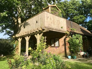 Exterior - Studio & balcony with tree growing through it, spiral staircase, stunning views. (Herstmonceux)