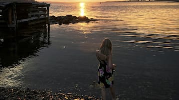 Guests can enjoy serene waterfront views from the shore.