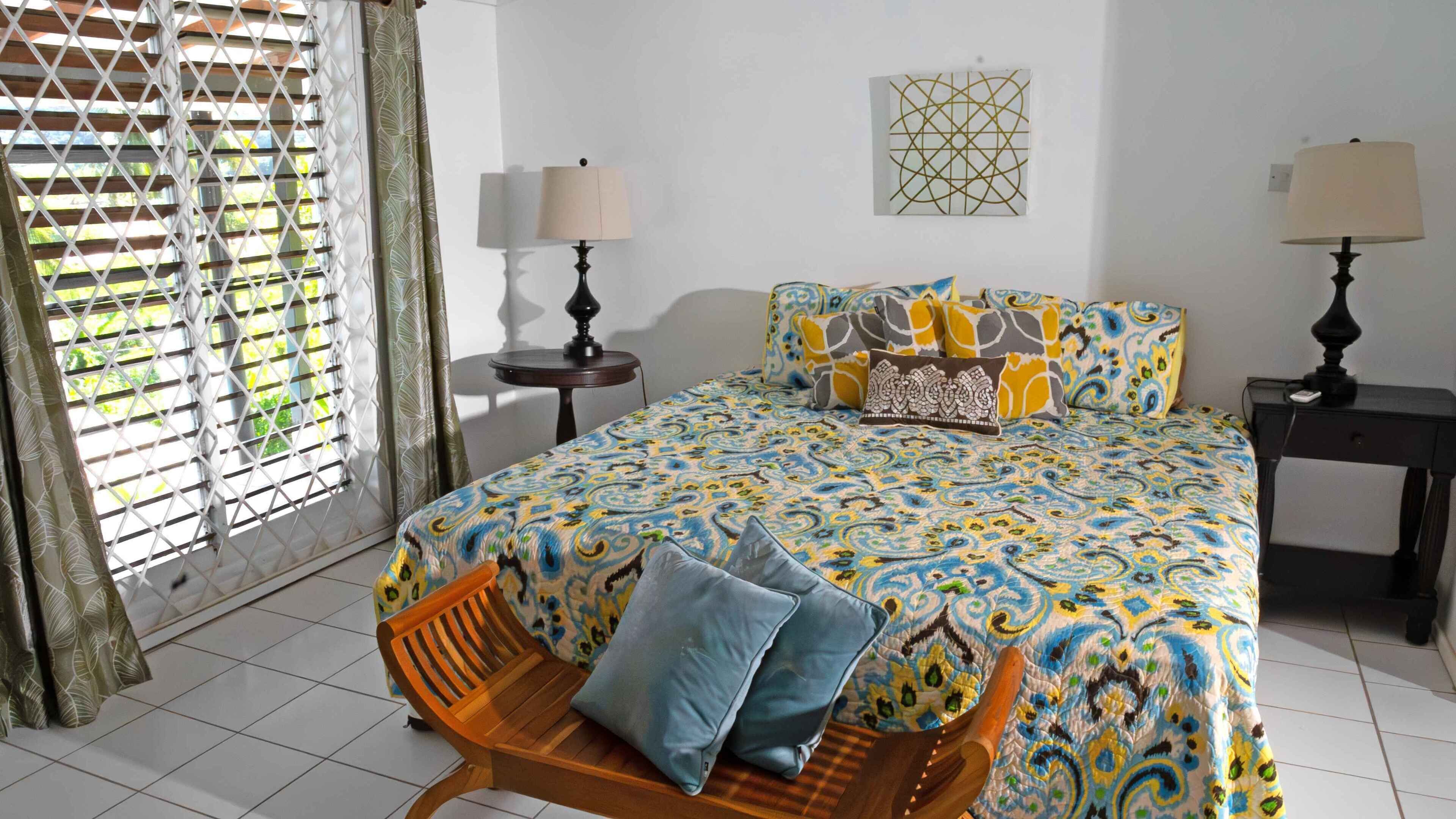 This is the master bedroom with en-suite. Offers direct access to the pool.
