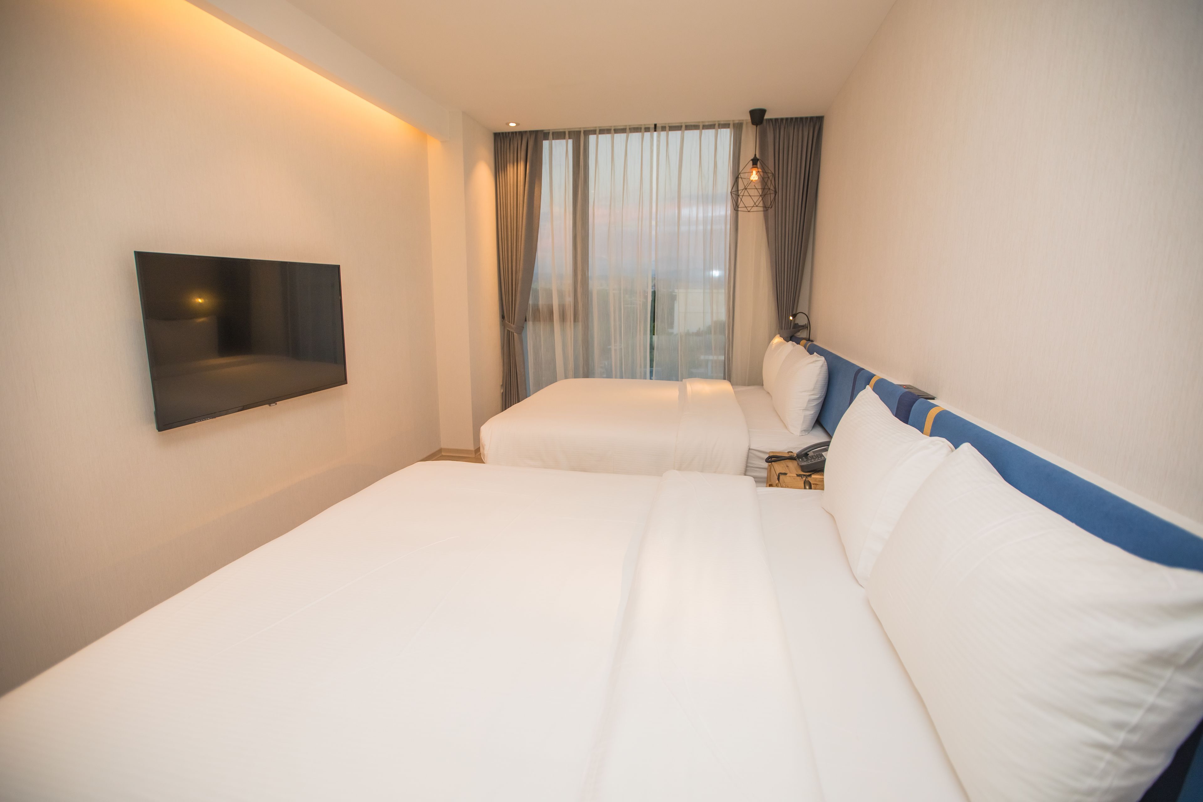 standard quadruple room, 2 double beds, concierge service | premium bedding, desk, blackout curtains, soundproofing