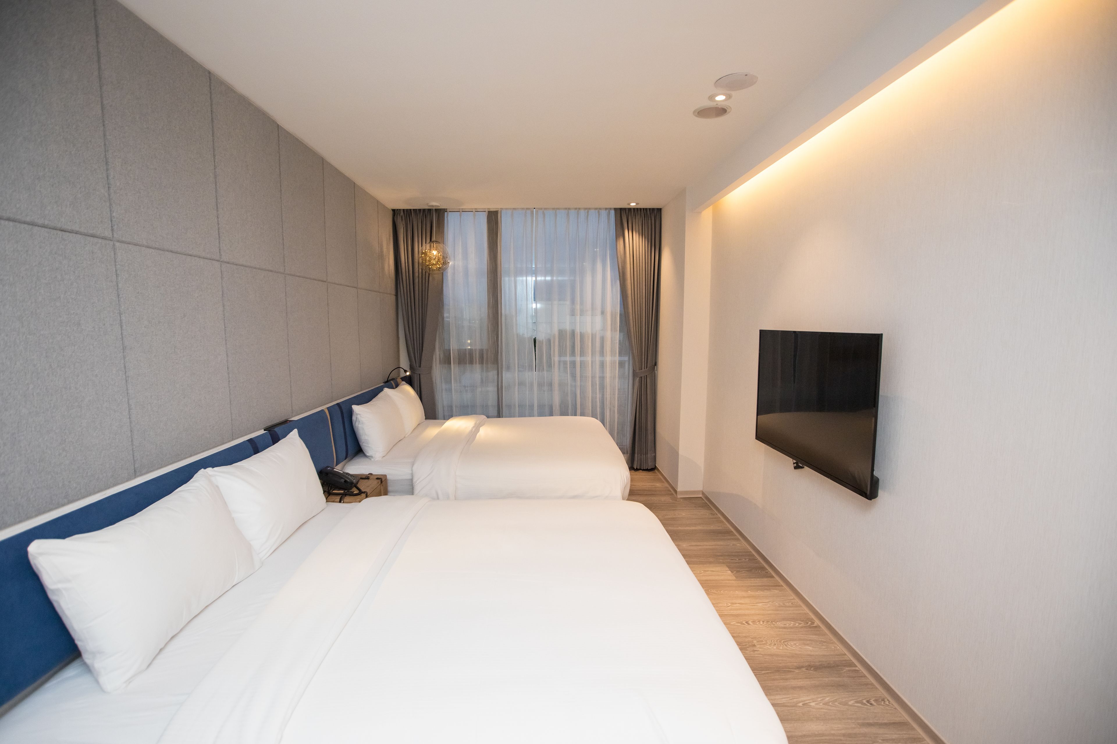 standard quadruple room, 2 double beds, concierge service | premium bedding, desk, blackout curtains, soundproofing