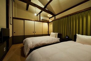 Suite Deluks | 1 kamar tidur, brankas, setrika/meja setrika, dan Wi-Fi gratis