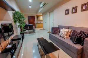 Apartment, 1 Bedroom | Living area | LCD TV - 1 Bedroom Apartment Casa Grande Residence by Travelio (Jakarta)