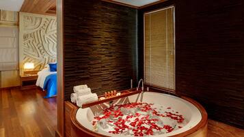 Villa, Beach View, Beachfront | Bathroom | Separate bathtub and shower, jetted bath, free toiletries, slippers