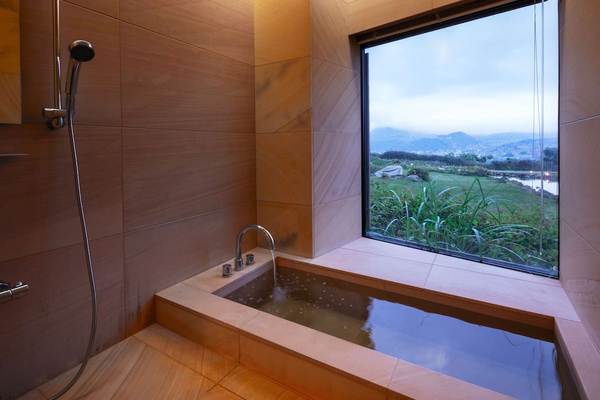 combined shower/bathtub, free toiletries, hair dryer, bathrobes